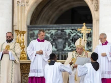 Pope Francis speaks at a Mass and canonization of 14 new saints in St. Peter's Square on Sunday, Oct. 20, 2024