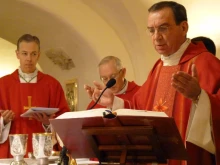 Archbishop Dennis Schnurr celebrates Mass at the tomb of St. Peter along with other bishops from the United States.