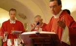 Archbishop Dennis Schnurr celebrates Mass at the tomb of St. Peter along with other bishops from the United States.