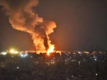 Fire and smoke rise at an area targeted by an Israeli airstrike on Beirut’s southern suburbs on Oct. 6, 2024.