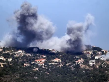 A cloud of smoke erupts during an Israeli air strike on the village of Sujud in southern Lebanon on Sept. 25, 2024. Israel announced dozens of new air strikes on Hezbollah strongholds in Lebanon on Sept. 24, a day after 492 people, including 35 children, were killed in the deadliest bombardment since a devastating war in 2006.