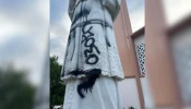 The statue of the patron saint of St. Francis de Sales Parish in Sherman Oaks has been vandalized three times total in September and August. The vandalism in the photograph is being investigated as a “hate crime” by local police, according to the church's pastor.